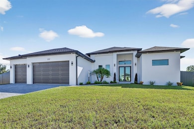 1327 NE 23rd St, Cape Coral, FL 33993 - photo 3