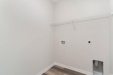 Laundry area with hookup for a washing machine, ho