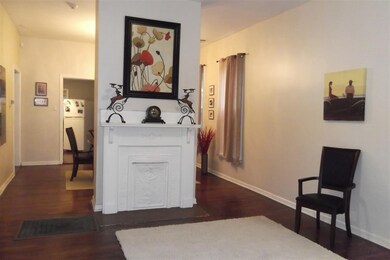 Living Room with decorative Fireplace, 9 ft. ceili