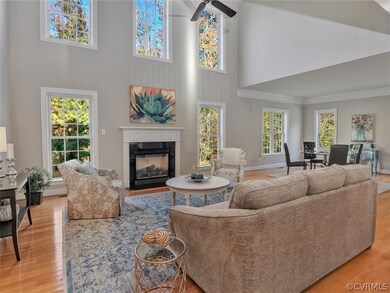 Huge two-story family room with gas fireplace and