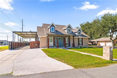 Cape cod-style house with brick siding, a front lawn, concrete driveway, a shingled roof, and covered porch