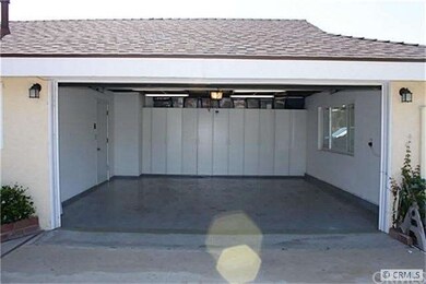 Finished garage with built in cabinets. Epoxy floo