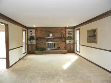 Family room with wood burning fireplace