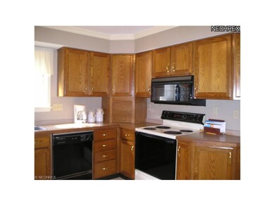Very Large Kitchen with Many Oak Cabinets