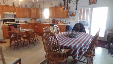 Large 21 x 16 Kitchen. The Kitchen door leads a la