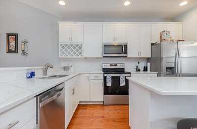 Kitchen featuring appliances with stainless steel 