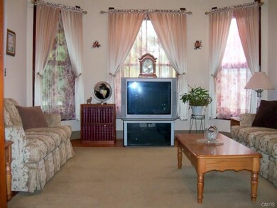 First floor front living room with hardwood floors