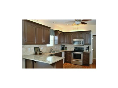 This kitchen was recently updated with painted cab