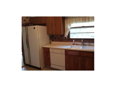 Kitchen has ample counter space and cabinets.