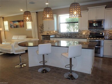 Coastal contemporary Kitchen with quartz and glass