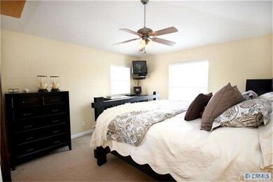 Private 3rd  level spacious master bedroom with ce