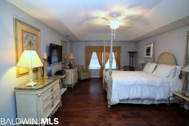 Master Room has woof floors and an enough room for