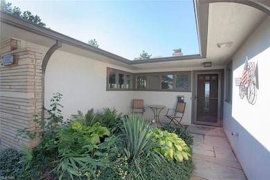 This courtyard with its serene greenery serves as 