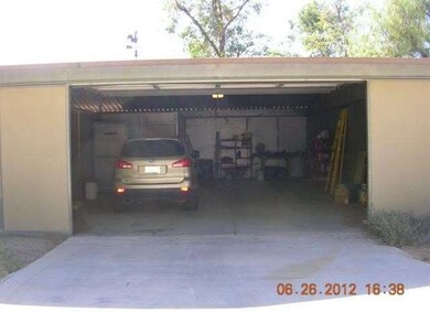 Home has attached 2 car carport and 2 car garage a