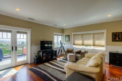 living area showing balcony for ocean viewing