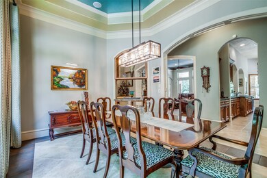 Dining room is complete with surround sound and open to the butler's pantry and kitchen.