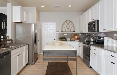 Spacious kitchen *Photos of furnished model. Not a