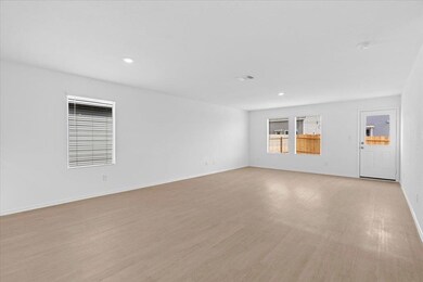 Unfurnished room with light wood-style flooring and recessed lighting