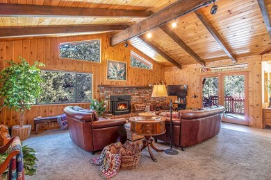 High ceilings, open beams + skylight