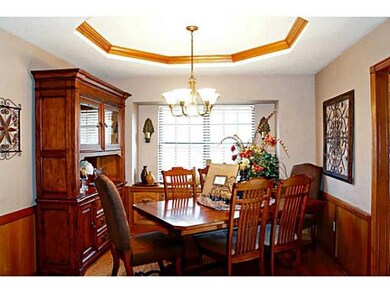 Dining Room. Formal Dining has Wood Floors & Crown Molding
