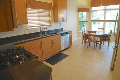 Kitchen with granite countertops.