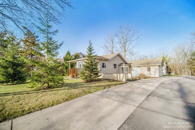 Front of home, driveway, garage