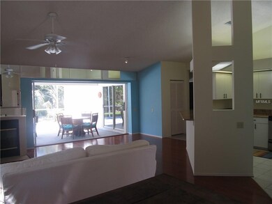 Large open great room plan and pocket sliders to l