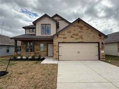 Craftsman house with a garage, covered porch, and