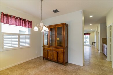 Dining room area flows into kitchen