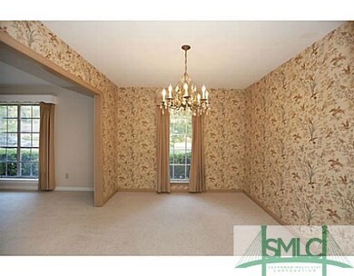 Dining Room. Separate dining room with chandelier.