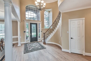 Formal entry with large closet under stairs