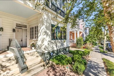 Surrounded by lovely homes with a front porch and