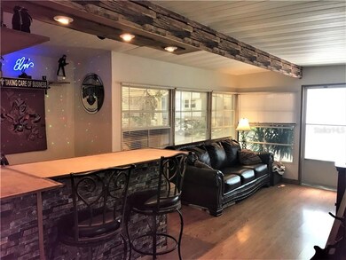 Another great view of the Florida room that has windows on three sides.