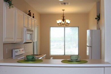 Closer View of Kitchen Bar to Dining