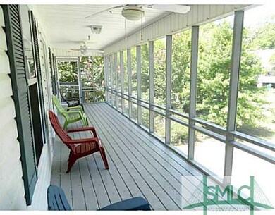 Porch. Generous screened porch with ceiling fans