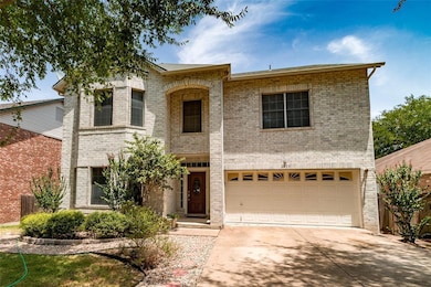 View of front of home featuring concrete driveway