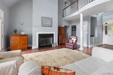 Living room featuring dark hardwood / wood-style f