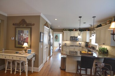 The kitchen has extra space before going into the 