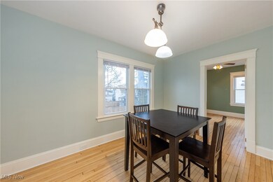 Dining space with light wood-type flooring