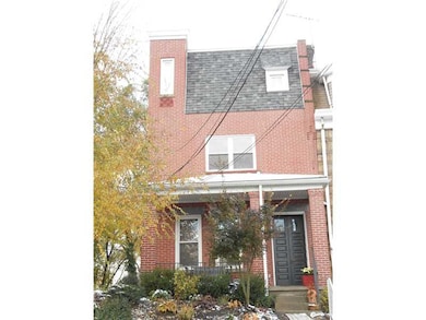 Exterior Front. Tasteful, low maintenance landscap