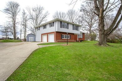 Nice wide concrete driveway.