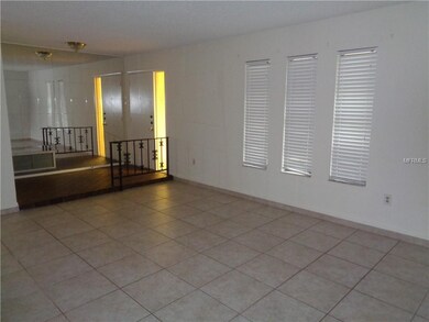Sunken living room, foyer and front door
