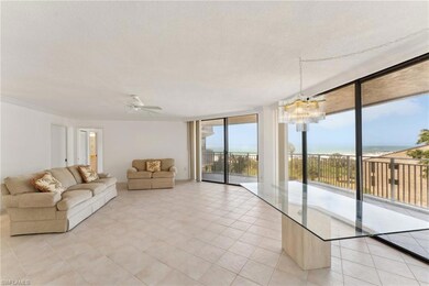 Unfurnished living room with ceiling fan with nota