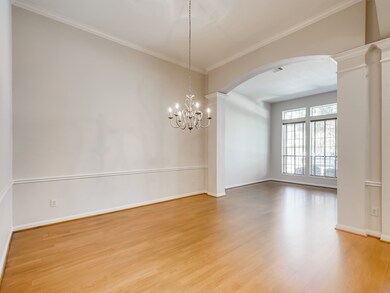 Just past the Living Room is the Formal Dining Room complete with Crown Molding and lovely Trim Accents.