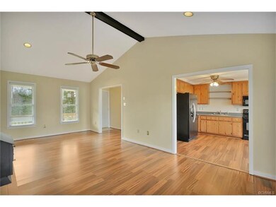 Living room with view to kitchen