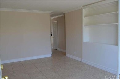 Living room with new paint, crown molding, etc...