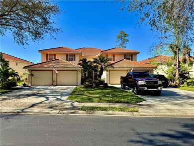 Mediterranean / spanish house with a front yard
