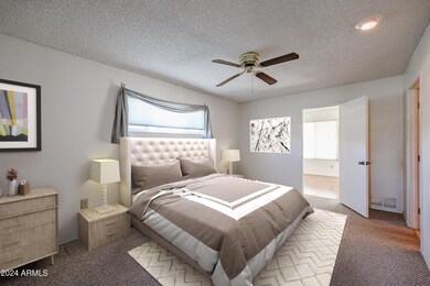 Primary Bedroom with ensuite and access to the Az Room