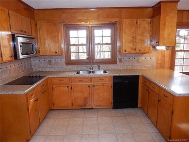Kitchen with tile backsplash
