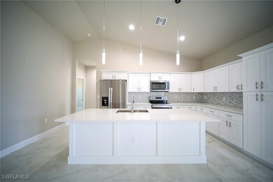 The Island Kitchen Comes With Quartz Countertops,